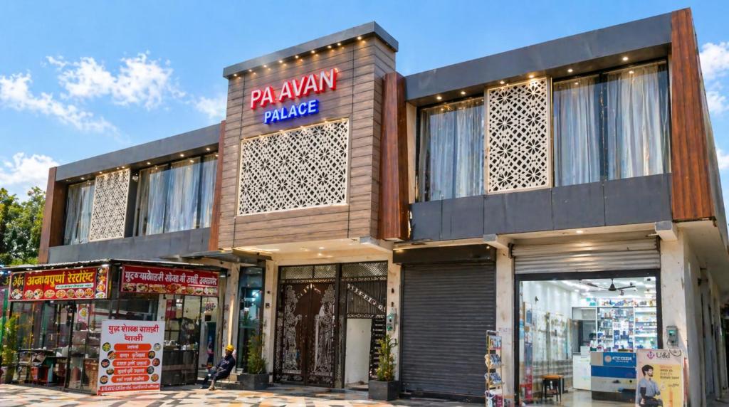 a store front of a building with a parking garage at Paavan Palace in Ayodhya