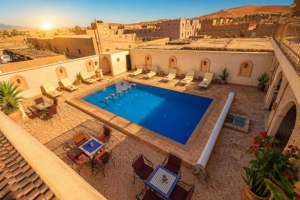 an overhead view of a swimming pool in a resort at Camels House in Merzouga