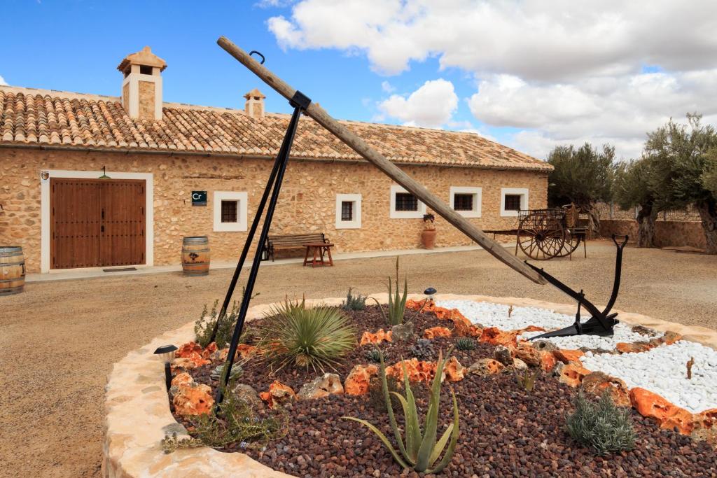 a garden in front of a building at Casa del Labrador in Jumilla