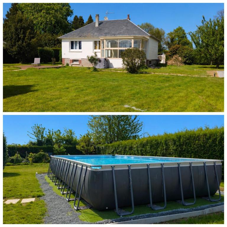 a house and a swimming pool in a yard at Le Clos de Valletot in Valletot