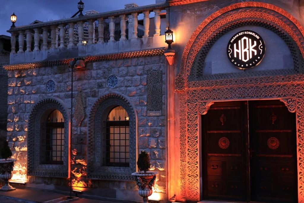 a building with a sign on the front of it at Hasan Bey Konakları in Avanos