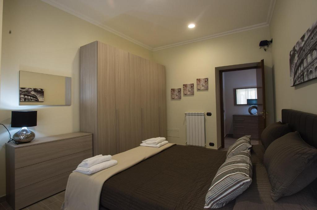 Cama o camas de una habitación en Le Cupoline