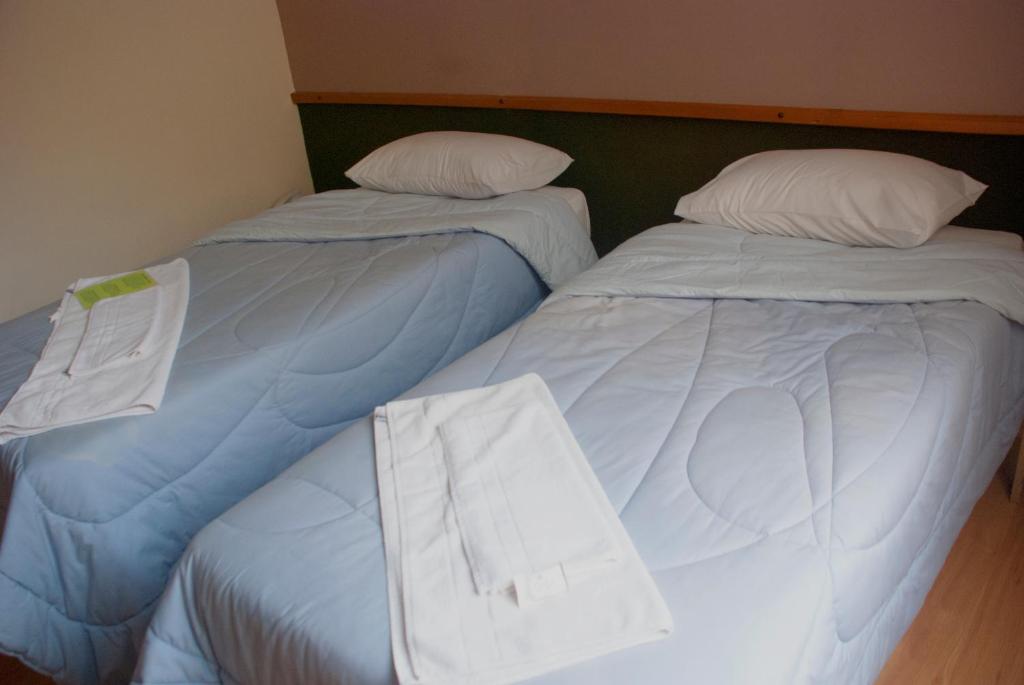 Hara Palace Hotel - Chambre Triple Avec 1 Lit Simple Et 1 Lit Double