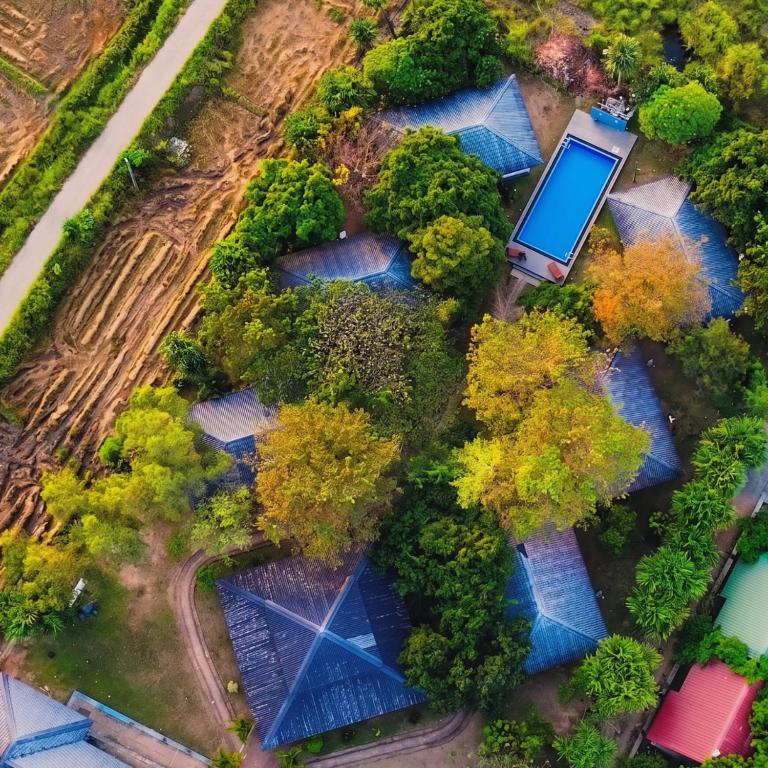 an overhead view of a garden with trees at Nature Luxe Sigiriya in Sigiriya