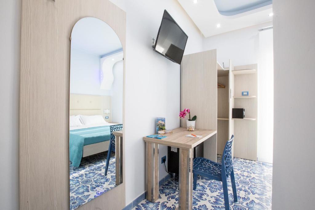 Postel nebo postele na pokoji v ubytování B&B Degli Aranci