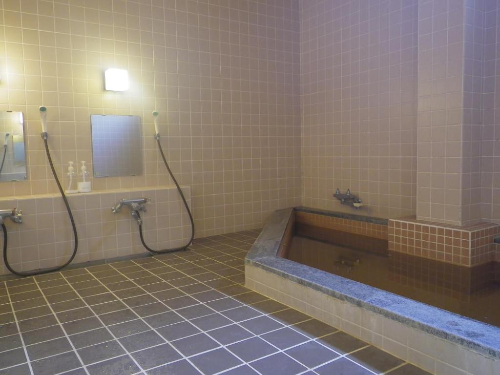 Koupelna v ubytování Resort Inn Murata