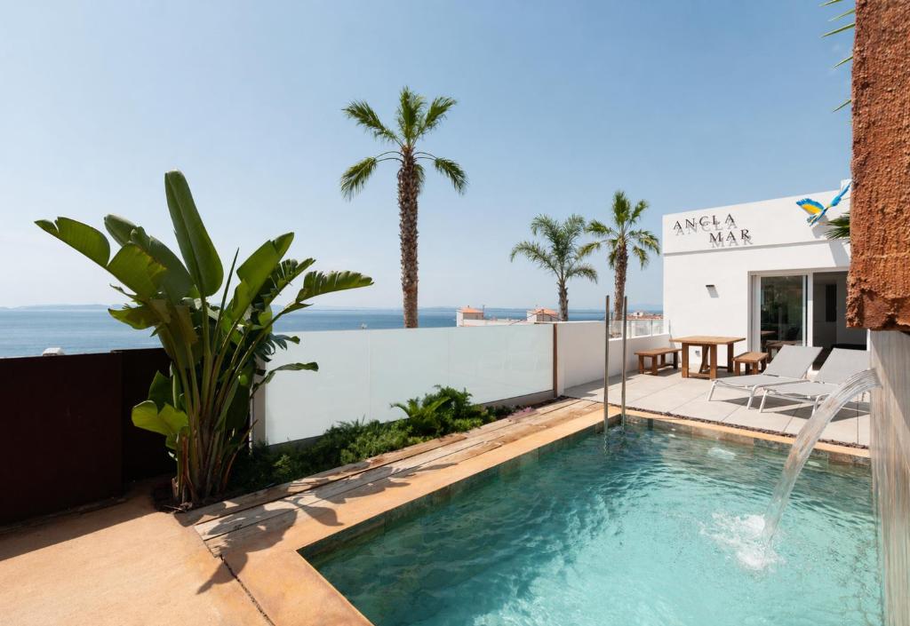 a swimming pool on the roof of a house at Vista Roses Mar - Ancla Mar in Roses