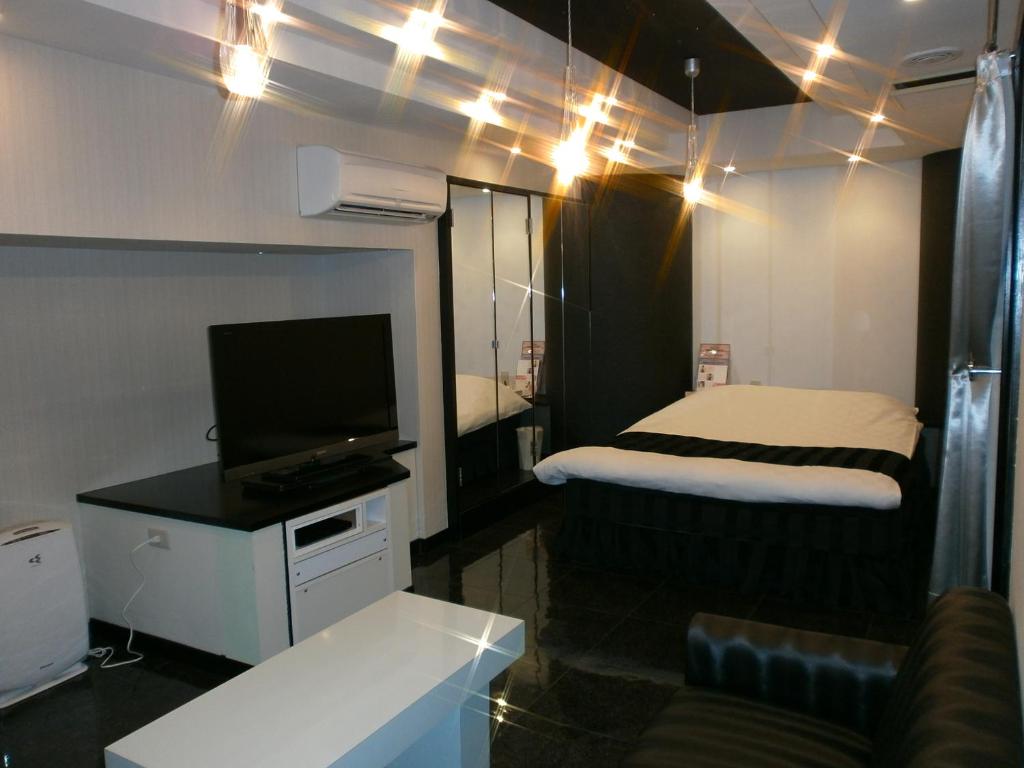 TV a/nebo společenská místnost v ubytování Hotel Piatt (Adult Only)