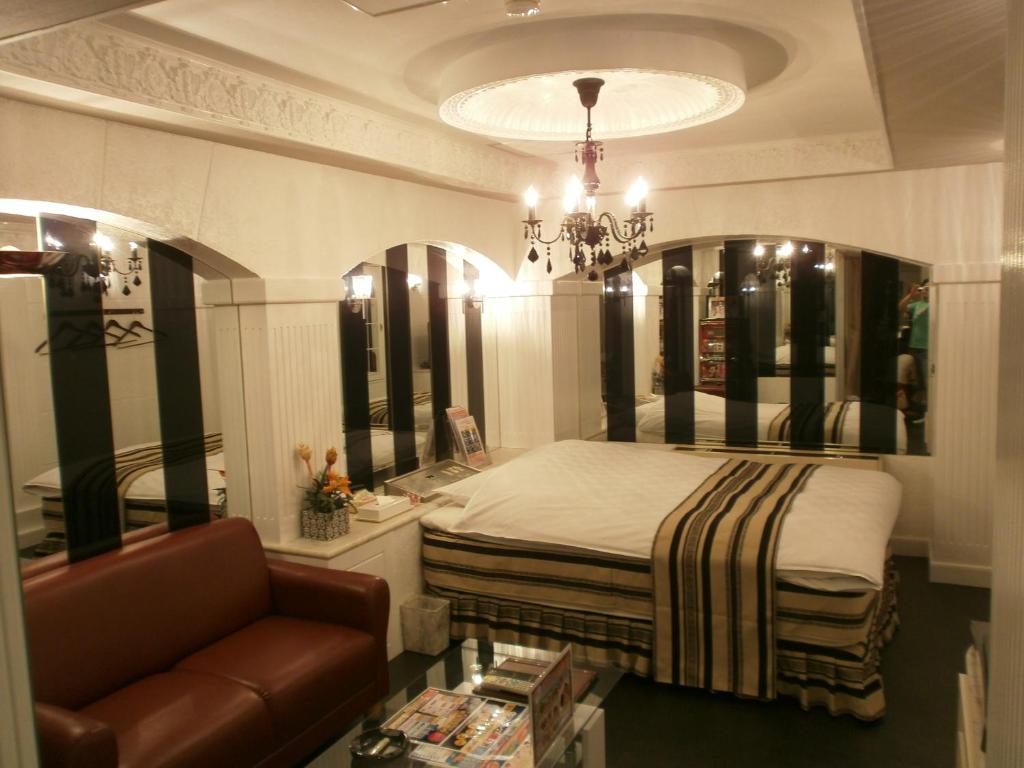 Postel nebo postele na pokoji v ubytování Hotel Piatt (Adult Only)