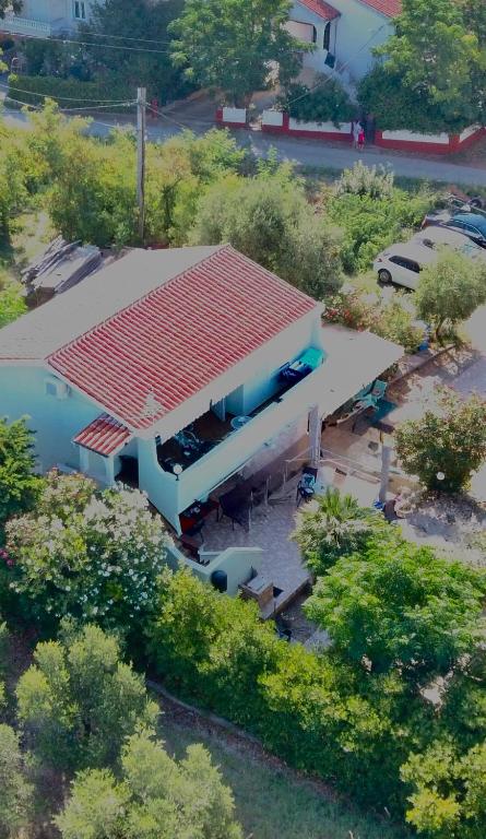 an overhead view of a building with a red roof at Apartments Gašparić in Barbat na Rabu