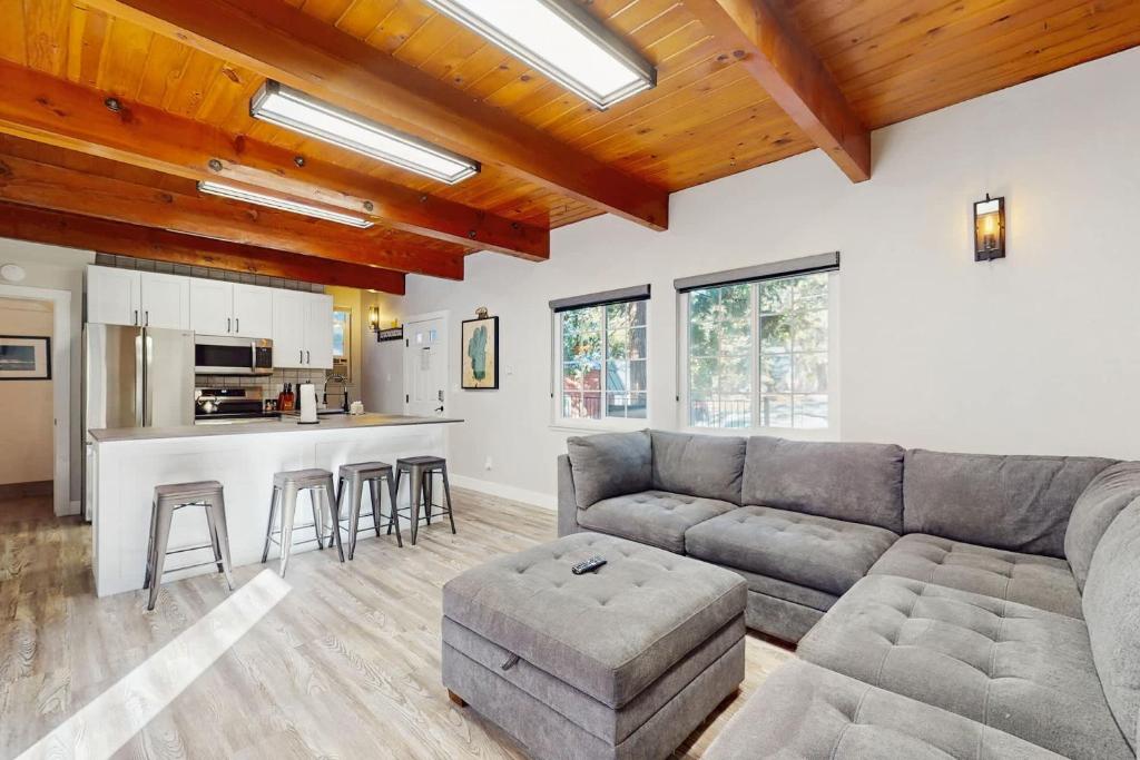 a living room with a couch and a table at Speckled Tahoe in Kings Beach