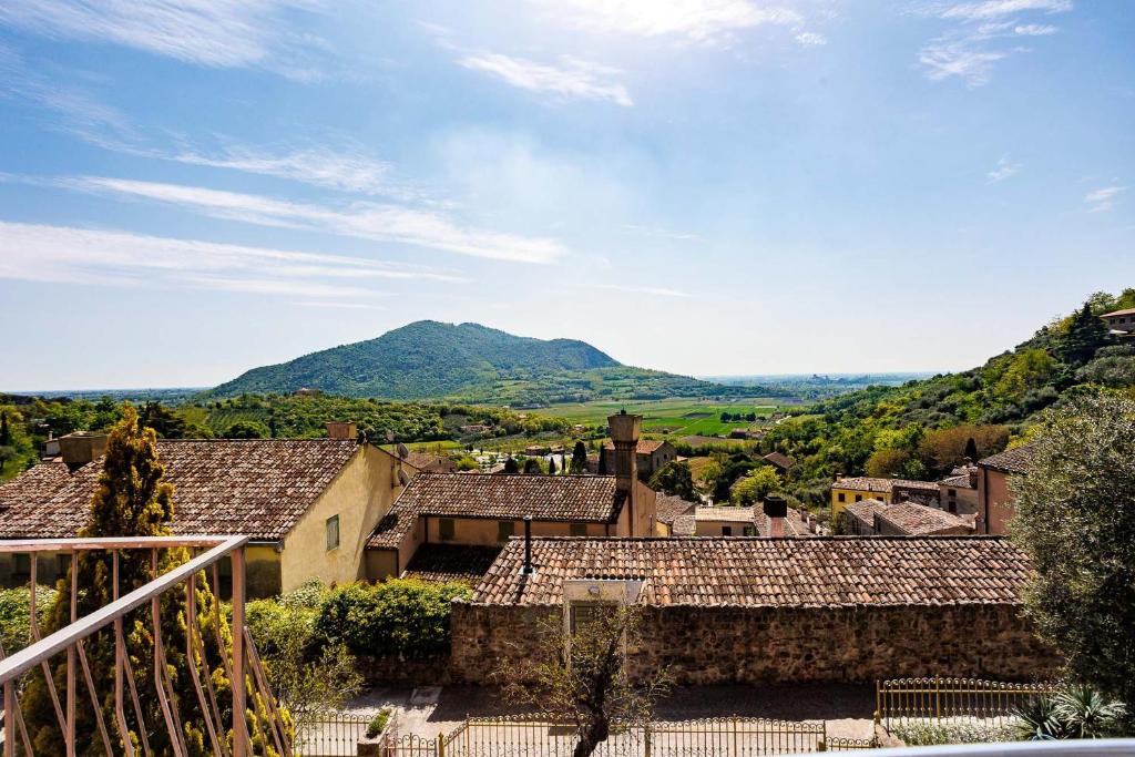 a view of a village with mountains in the background at Il Sentiero di Arquà in Arquà Petrarca