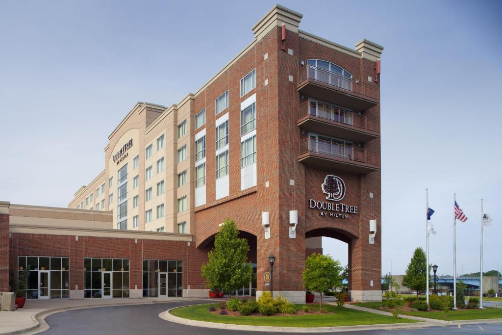a rendering of the dunder mifflin building at DoubleTree by Hilton Bay City - Riverfront in Bay City