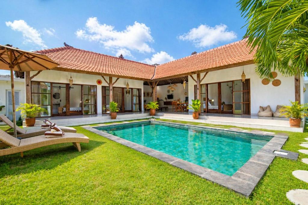 an image of a villa with a swimming pool at Simple & Magical Villas PRAYA in Seminyak