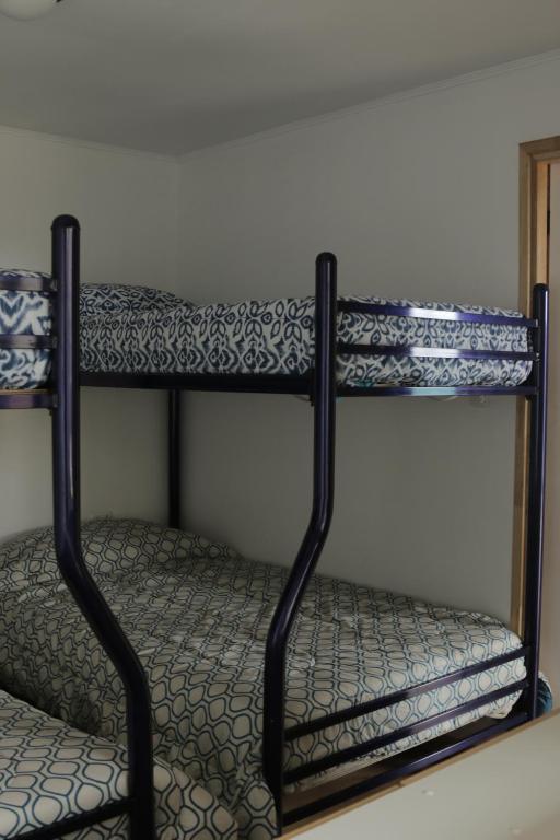 Postel nebo postele na pokoji v ubytování Cabañas Arenita