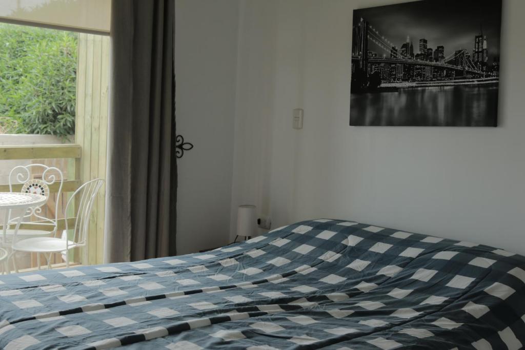 Postel nebo postele na pokoji v ubytování Cabañas Arenita