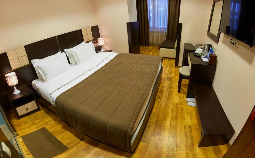 Krevet ili kreveti u jedinici u okviru objekta Hotel Lilia Yerevan