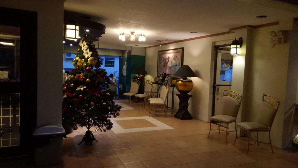 Posezení v ubytování DM Residente Hotel Inns & Villas