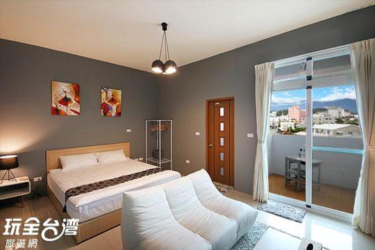 Cama o camas de una habitación en 鐵花國小民宿