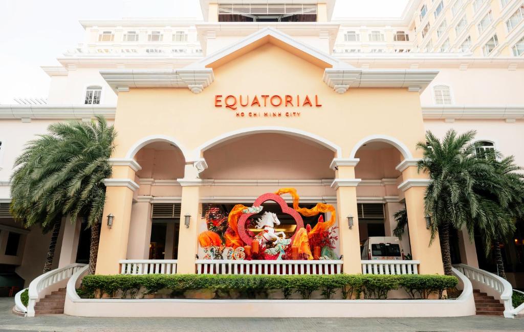 a building in front of a hotel at Equatorial Ho Chi Minh City in Ho Chi Minh City