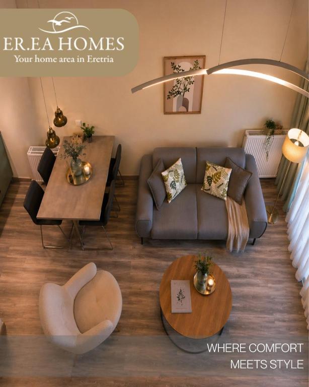 a living room with a couch and a table at EREA Homes Apartments in Eretria