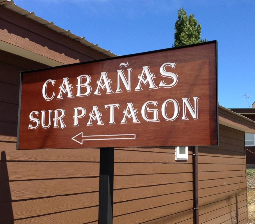 a sign that reads cazams supreme patagonian at Cabañas Sur Patagón in Puerto Varas