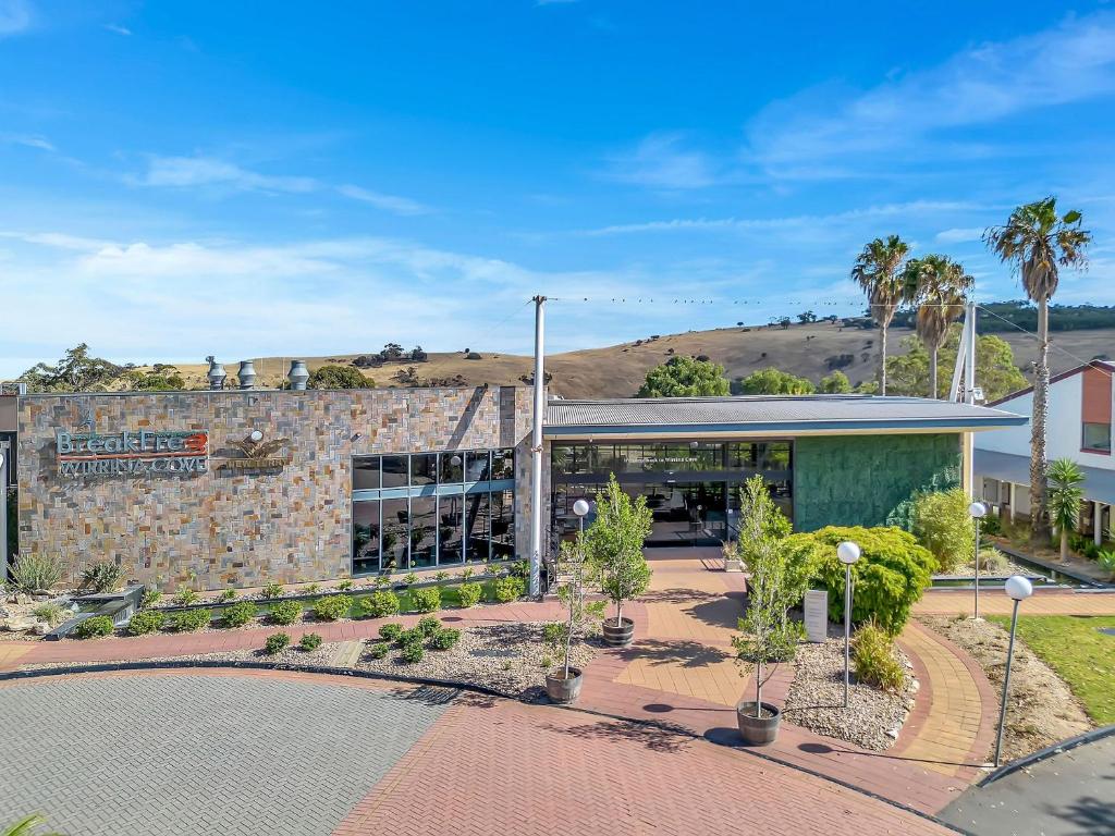 a brick building with trees in front of it at BreakFree Wirrina Cove in Wirrina Cove