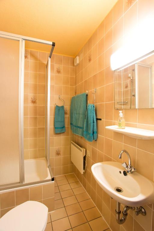 Koupelna v ubytování Ferienappartements mit Herz