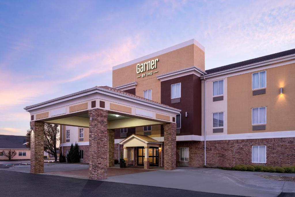 a rendering of the exterior of a hotel at Garner Hotel Liberal North by IHG in Liberal