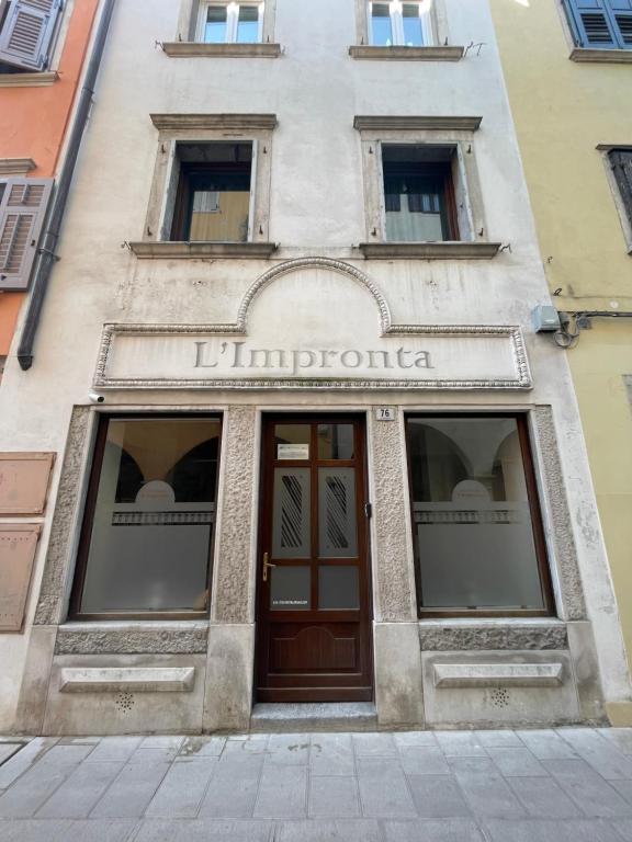 a facade of a building with a door at l'impronta in Gorizia