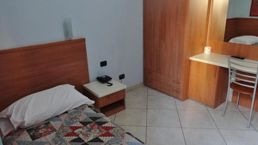 Posteľ alebo postele v izbe v ubytovaní Hotel2000