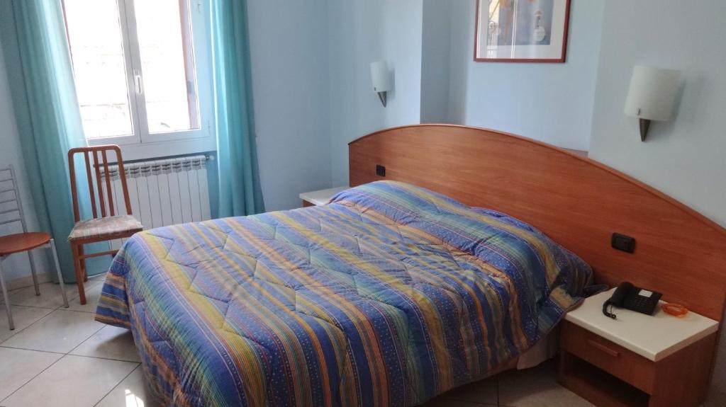 Posteľ alebo postele v izbe v ubytovaní Hotel2000