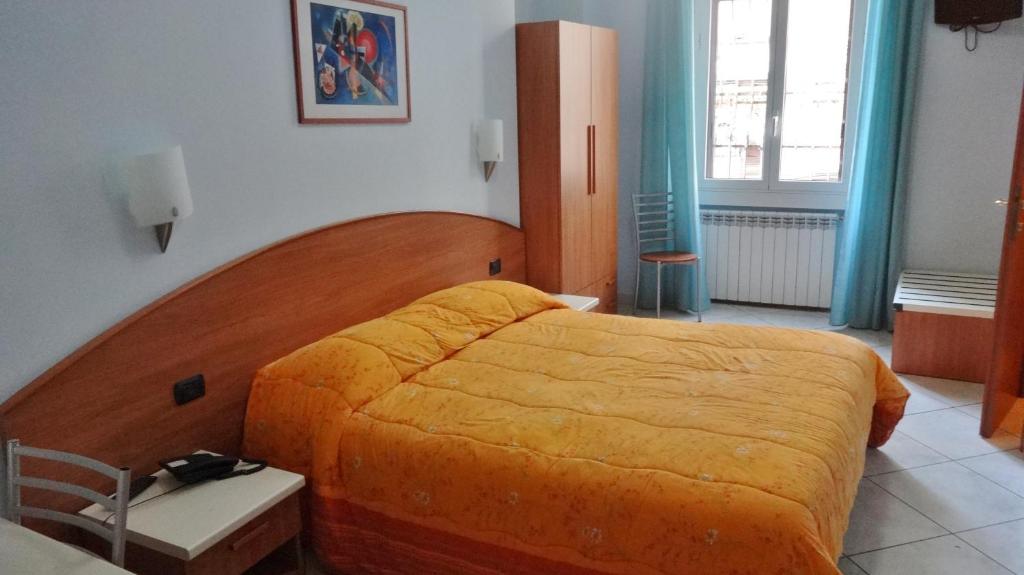 Posteľ alebo postele v izbe v ubytovaní Hotel2000