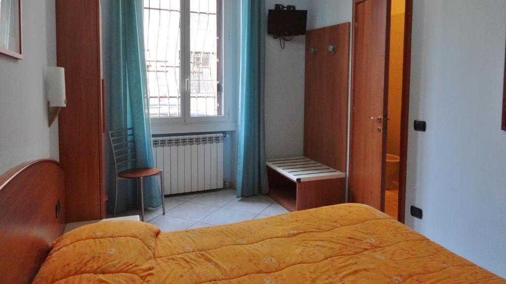 Posteľ alebo postele v izbe v ubytovaní Hotel2000
