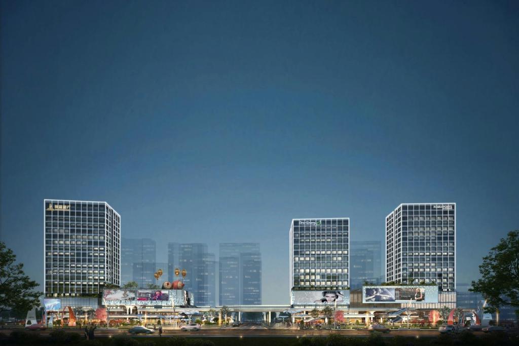 a group of tall buildings in a city at Four Points by Sheraton Jinan, High-Tech Zone in Jinan
