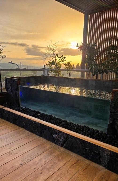 a swimming pool in the middle of a building at מרום הגילבוע in Gid‘ona