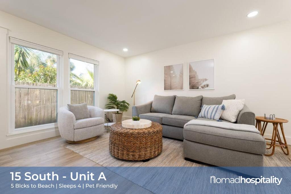 a living room with a couch and two chairs at Be A Nomad 2 br Close to the Beach in Jacksonville Beach