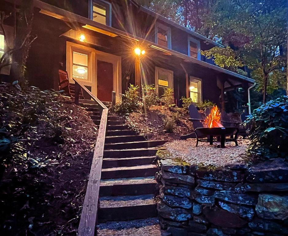 a house with a fire in front of it at Cute n Chic in Clayton in Clayton