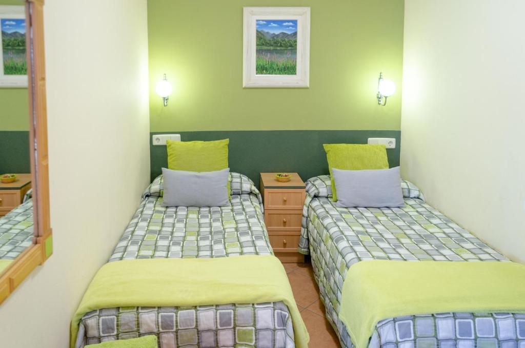 Postel nebo postele na pokoji v ubytování Apartaments La Bonaigua