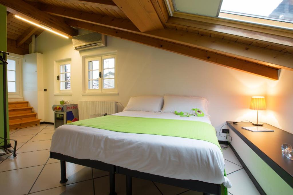Postel nebo postele na pokoji v ubytování Albergo Giardino