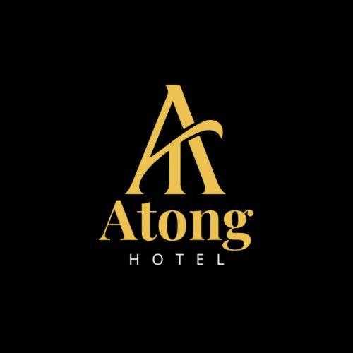 a logo for aong hotel with a initials at Atong Hotel in Chancay