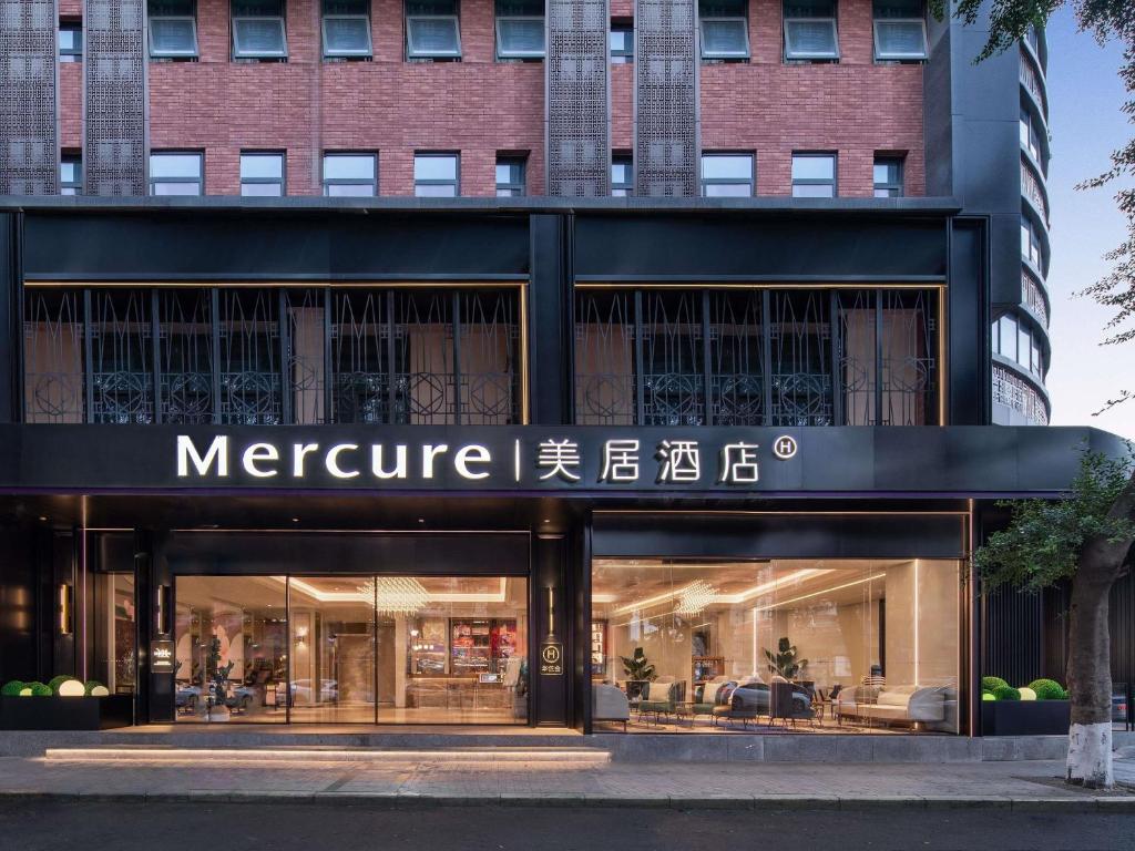 a store front with a sign for a store at Mercure Chengdu Wuhou Temple in Chengdu