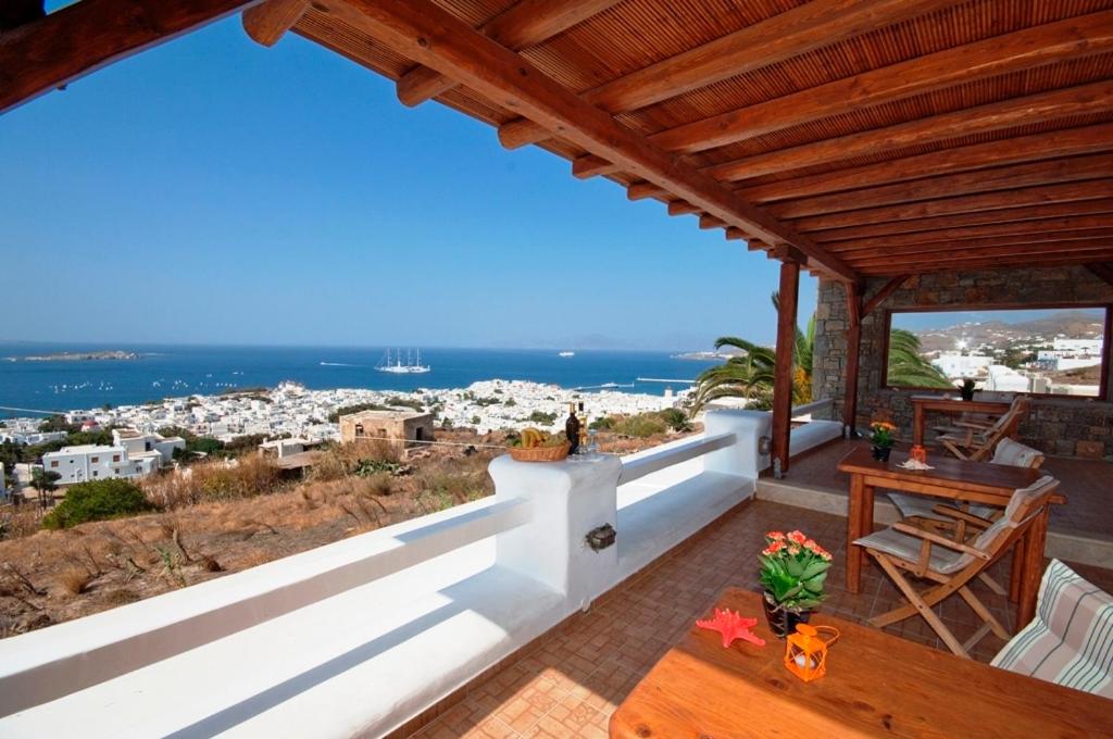 a house with a view of the ocean at Germanos Studios in Mýkonos City