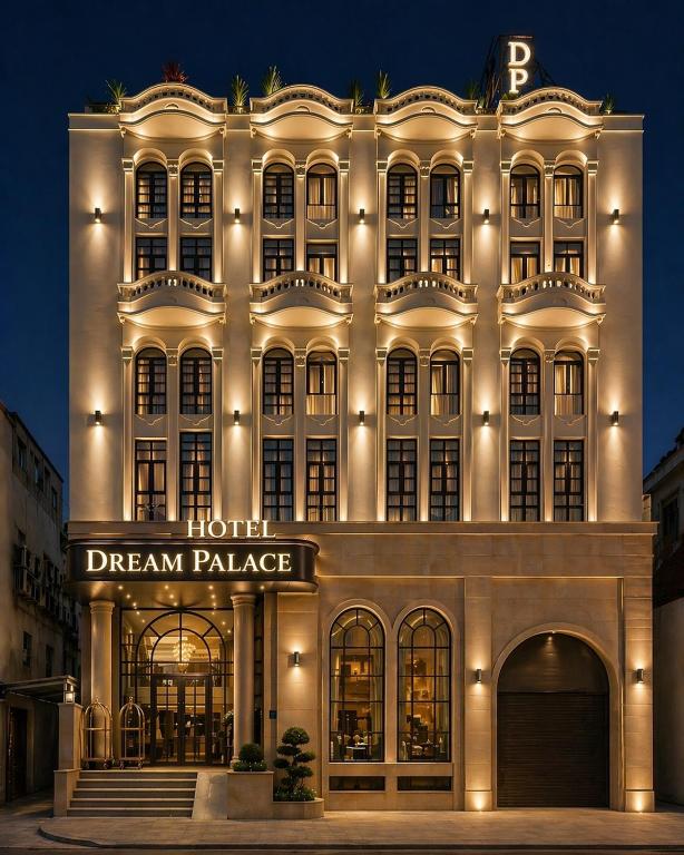 a hotel with a sign on the front of a building at Dream Palace Ben Thanh Grand Hotel in Ho Chi Minh City