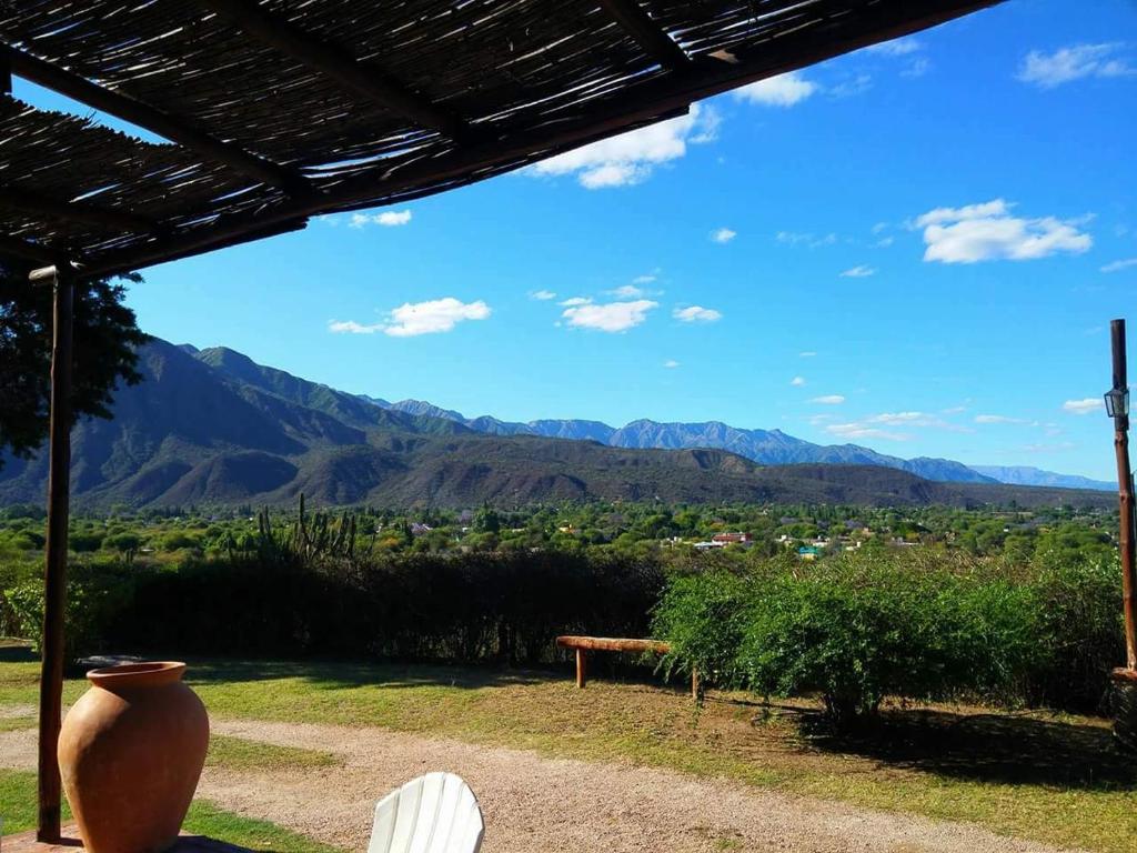 a view of the mountains from the porch of a house at Cabañas Altos del Velazco in La Rioja