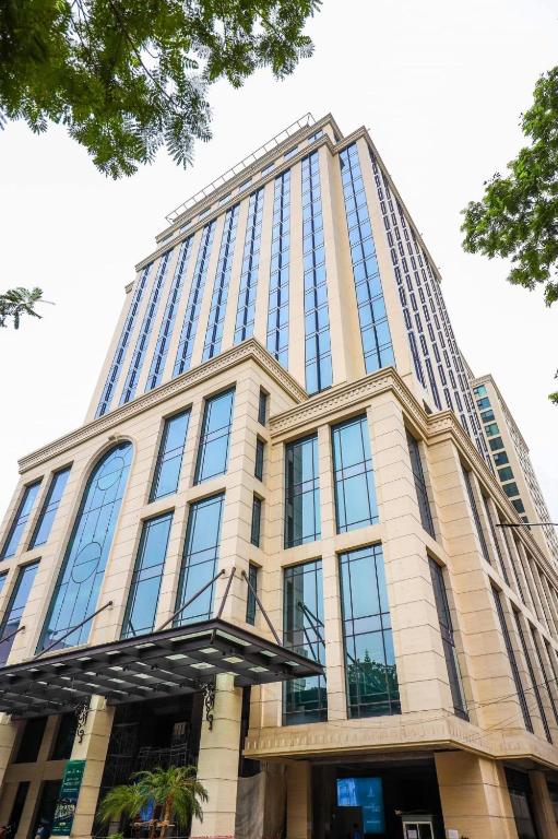 a tall building with a lot of windows at BRG Premium Apartments in Hai Phong