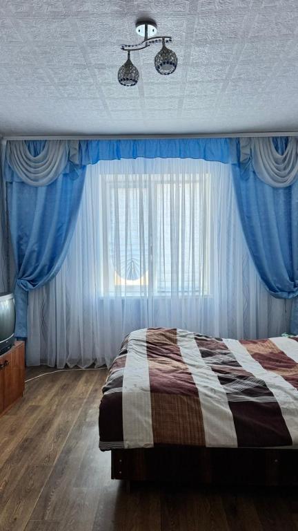 Katil atau katil-katil dalam bilik di Central comfort hotel