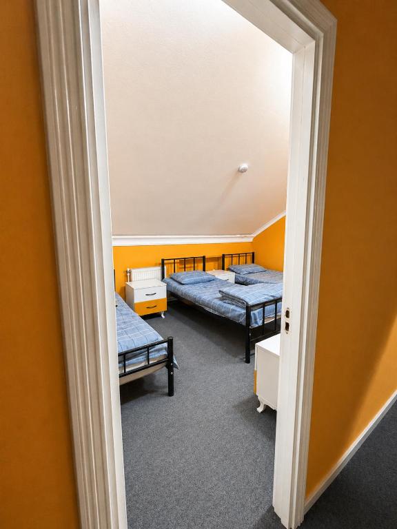 Smile Hostel - Camera Tripla Con Bagno In Comune