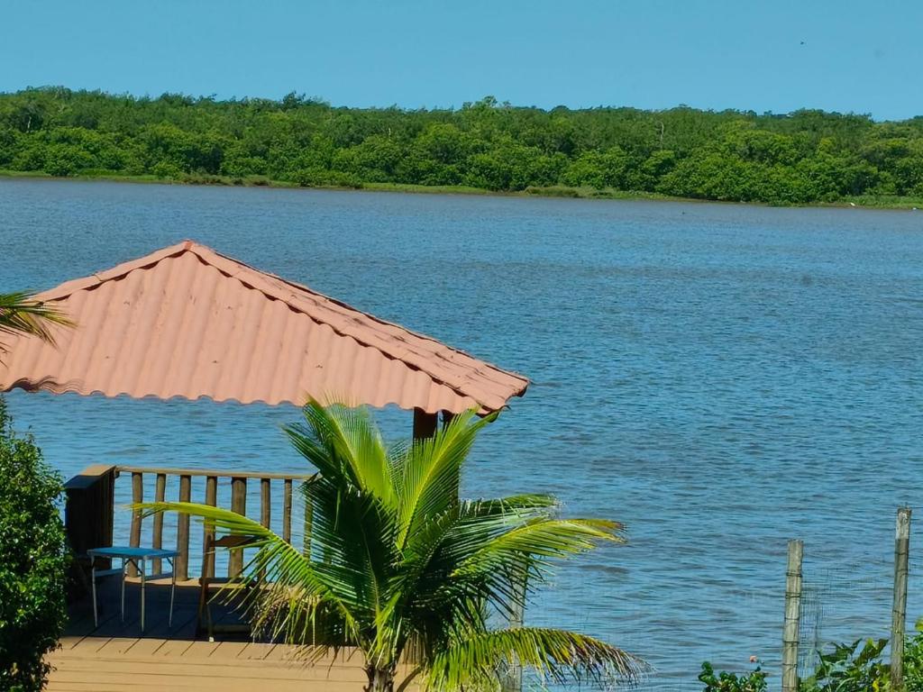 a view of the water from a house with a dock at Lazer , Descanso, Pesca e Praia in Iguape