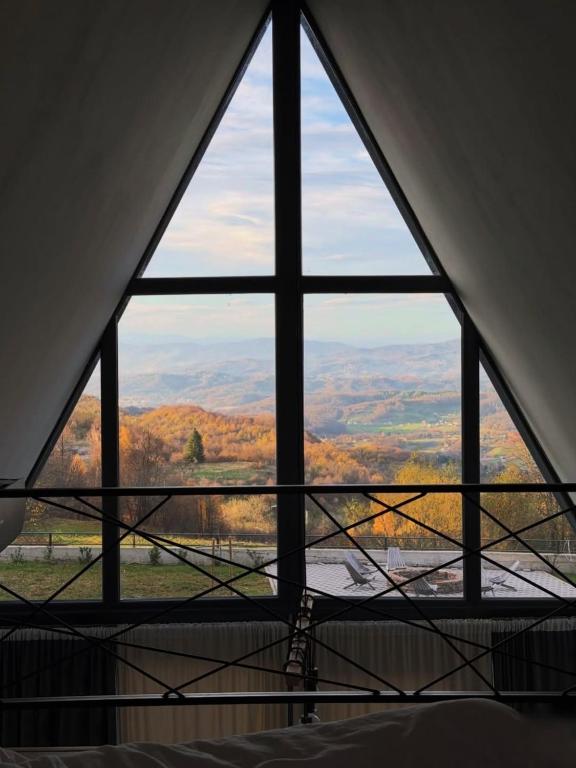 a view from a window in a room at Klek 77 Luxury Chalets near Jahorina in Paočići